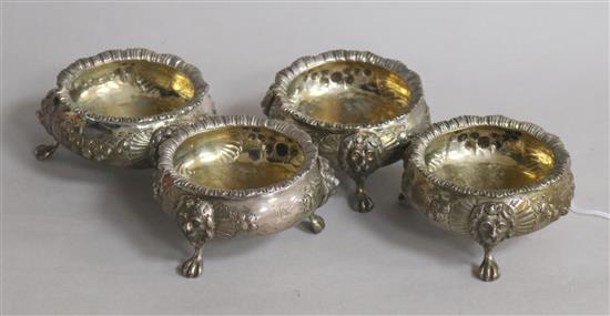 A set of four Victorian silver embossed bun salts, Charles Boyton II, London, 1870, 11 oz.